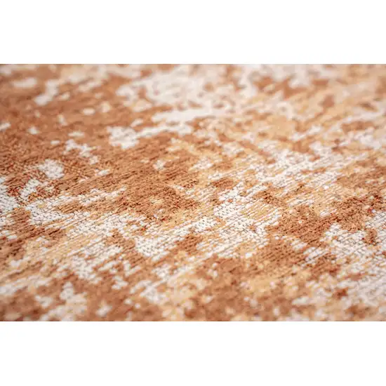 5' Orange And White Abstract Washable Round Rug With UV Protection Photo 4