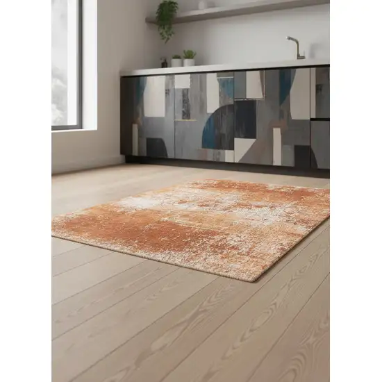 5' Orange And White Abstract Washable Round Rug With UV Protection Photo 1