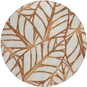 Photo of 8' Orange Beige And Copper Round Floral Washable Indoor Outdoor Area Rug