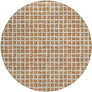 Photo of 8' Orange Beige And Copper Round Geometric Washable Indoor Outdoor Area Rug