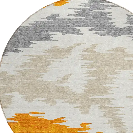 8' Orange Beige And Ivory Round Abstract Washable Indoor Outdoor Area Rug Photo 4