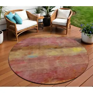 Photo of 8' Orange Blush And Yellow Round Abstract Washable Indoor Outdoor Area Rug