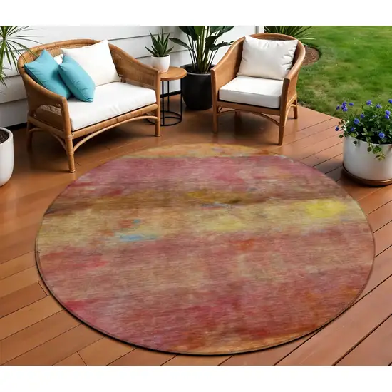 8' Orange Blush And Yellow Round Abstract Washable Indoor Outdoor Area Rug Photo 1