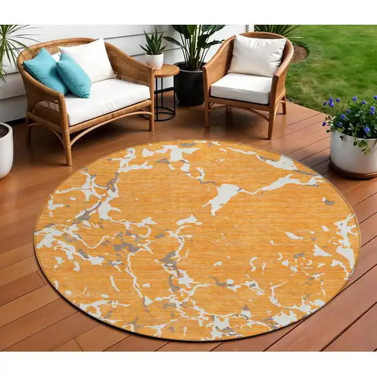 8' Orange Brown And Ivory Round Striped Washable Indoor Outdoor Area Rug Photo 1