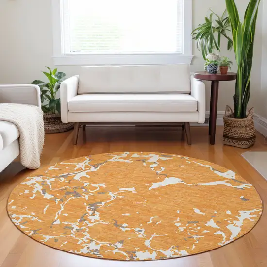 8' Orange Brown And Ivory Round Striped Washable Indoor Outdoor Area Rug Photo 9