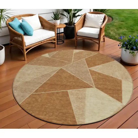 8' Orange Copper And Beige Round Geometric Washable Indoor Outdoor Area Rug Photo 1