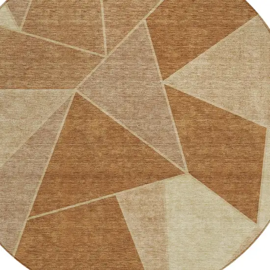 8' Orange Copper And Beige Round Geometric Washable Indoor Outdoor Area Rug Photo 5