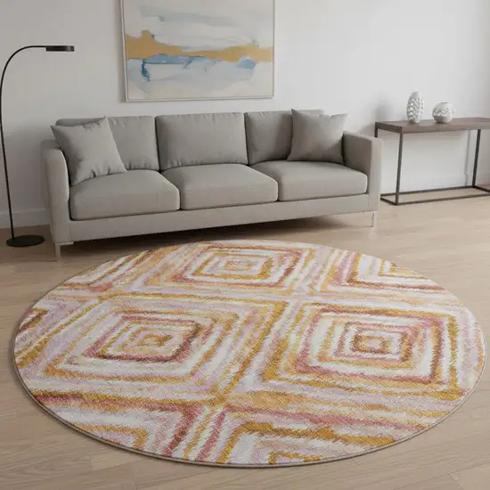 8' Orange Copper And Gold Geometric Washable Round Rug With UV Protection Photo 2
