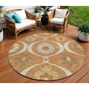 Photo of 8' Orange Copper And Gray Round Medallion Washable Indoor Outdoor Area Rug