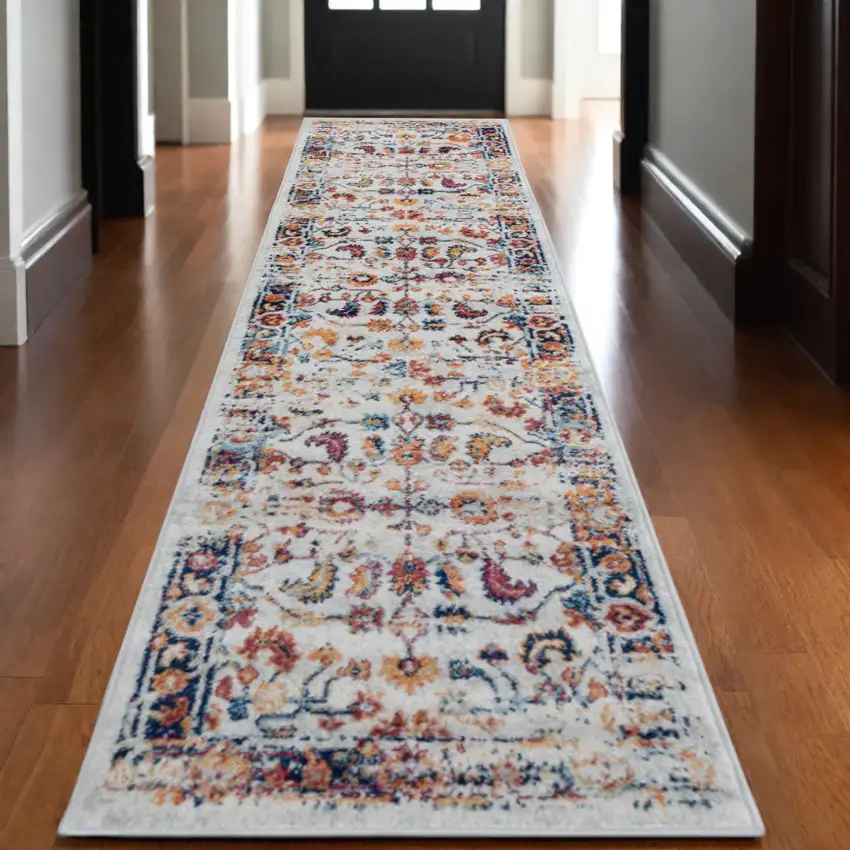 10' Ivory Navy and Orange Floral Power Loom Runner Rug Photo 1