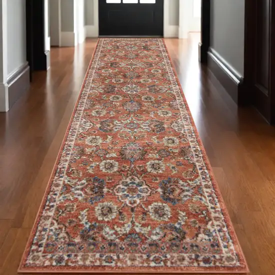 10' Ivory Blue and Orange Floral Power Loom Runner Rug Photo 1