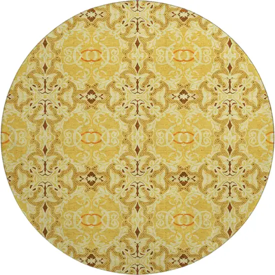 8' Orange Gold And Ivory Medallion Washable Round Rug With UV Protection Photo 1