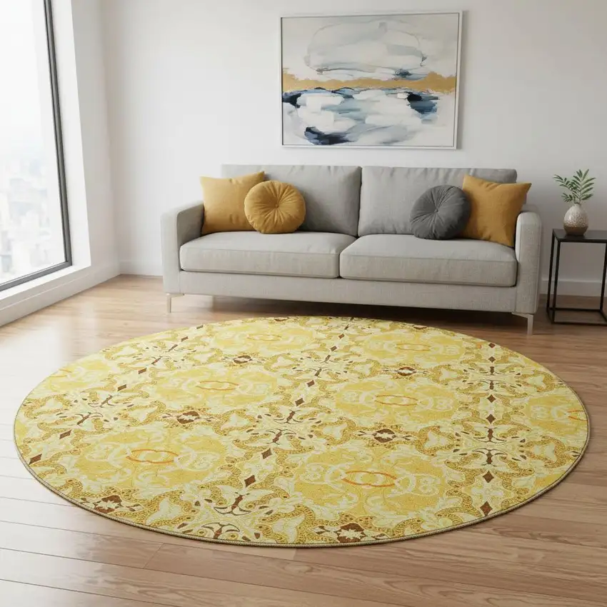 8' Orange Gold And Ivory Medallion Washable Round Rug With UV Protection Photo 2