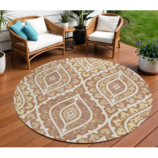 8' Orange Gold And Ivory Round Floral Washable Indoor Outdoor Area Rug Photo 1
