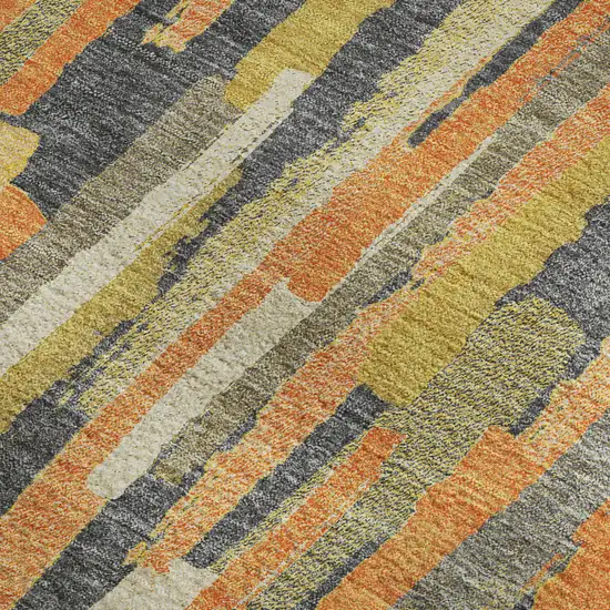 8' Orange Gold And Ivory Striped Washable Area Rug With UV Protection Photo 2