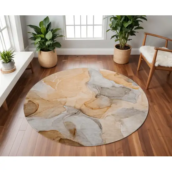 8' Orange Gray And Ivory Abstract Washable Round Rug With UV Protection Photo 2