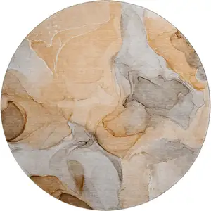 Photo of 8' Orange Gray And Ivory Abstract Washable Round Rug With UV Protection
