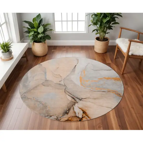 8' Orange Gray And Ivory Abstract Washable Round Rug With UV Protection Photo 2