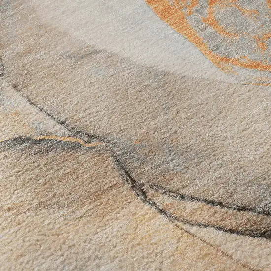 8' Orange Gray And Ivory Abstract Washable Round Rug With UV Protection Photo 9
