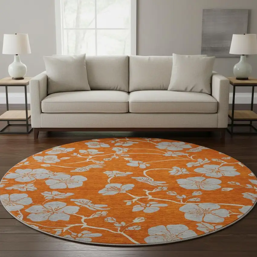 8' Orange Gray And Ivory Floral Washable Round Rug With UV Protection Photo 2