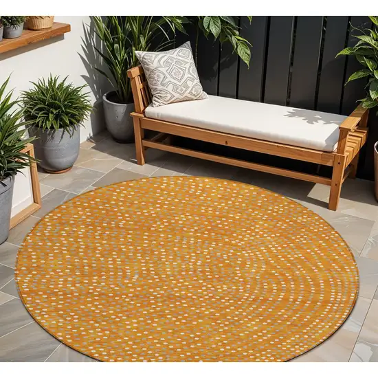 8' Orange Gray And Ivory Round Polka Dot Washable Indoor Outdoor Area Rug Photo 1