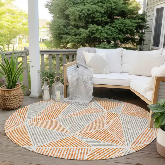 8' Orange Gray And Silver Round Geometric Washable Indoor Outdoor Area Rug Photo 6