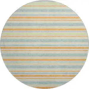 Photo of 8' Orange Green And Blue Striped Washable Round Rug With UV Protection