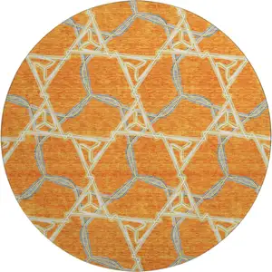 Photo of 8' Orange Ivory And Blue Geometric Washable Round Rug With UV Protection