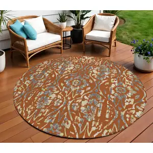 Photo of 8' Orange Ivory And Dark Gray Round Floral Washable Indoor Outdoor Area Rug