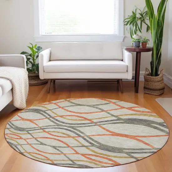 8' Orange Ivory And Gold Abstract Washable Round Rug With UV Protection Photo 5