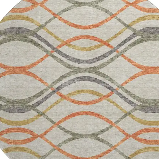 8' Orange Ivory And Gold Abstract Washable Round Rug With UV Protection Photo 3