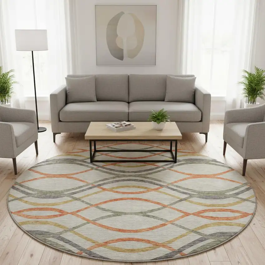 8' Orange Ivory And Gold Abstract Washable Round Rug With UV Protection Photo 2