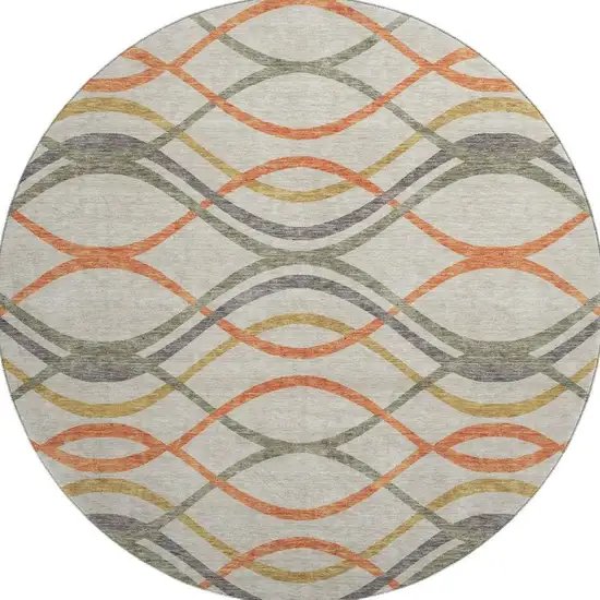 8' Orange Ivory And Gold Abstract Washable Round Rug With UV Protection Photo 4