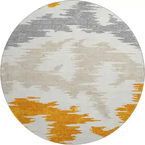 Photo of 8' Orange Ivory And Gray Abstract Washable Round Rug With UV Protection