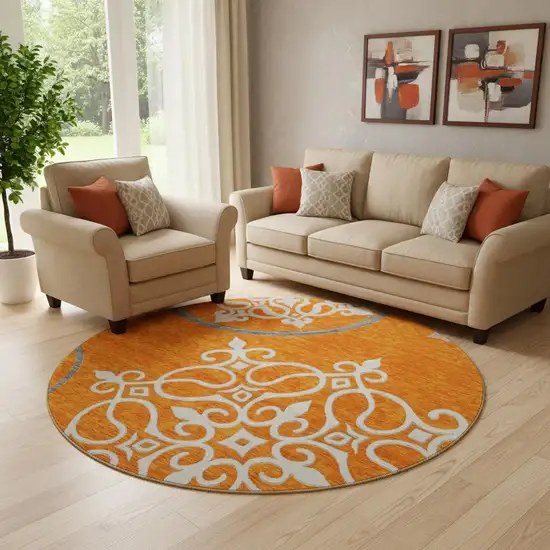 8' Orange Ivory And Gray Floral Medallion Washable Round Rug With UV Protection Photo 1