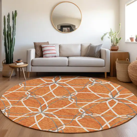 8' Orange Ivory And Gray Geometric Washable Round Rug With UV Protection Photo 4