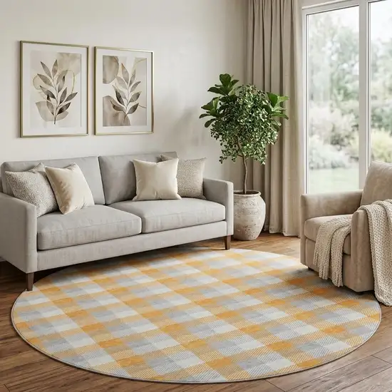 8' Orange Ivory And Gray Plaid Washable Round Rug With UV Protection Photo 1