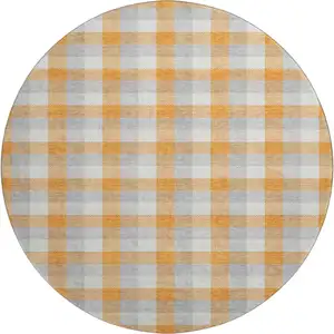 Photo of 8' Orange Ivory And Gray Plaid Washable Round Rug With UV Protection