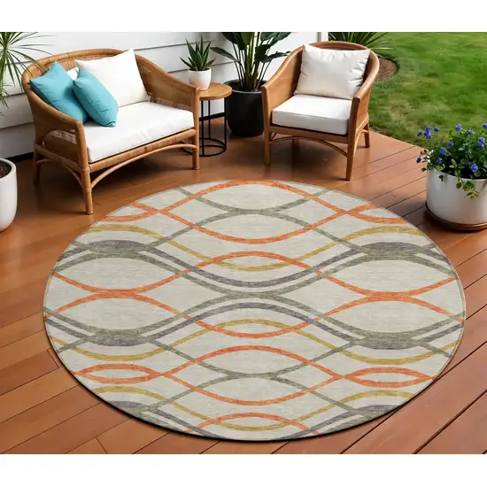 8' Orange Ivory And Gray Round Abstract Washable Indoor Outdoor Area Rug Photo 1