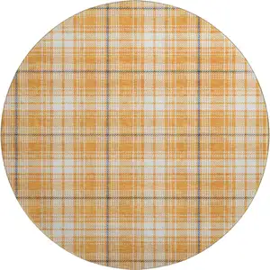 Photo of 8' Orange Ivory And Navy Blue Plaid Washable Round Rug With UV Protection