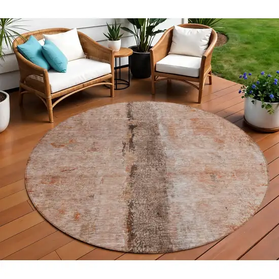 8' Orange Peach And Brown Round Abstract Washable Indoor Outdoor Area Rug Photo 1