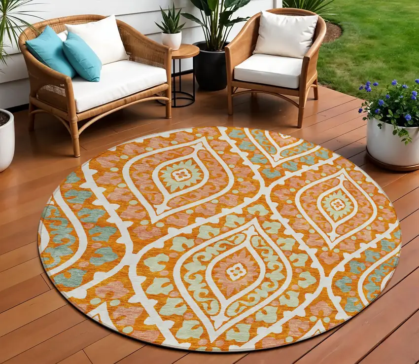 8' Orange Peach And Ivory Round Floral Washable Indoor Outdoor Area Rug Photo 1