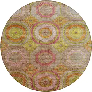 Photo of 8' Orange Pink And Gold Round Geometric Washable Indoor Outdoor Area Rug