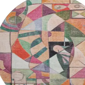 Photo of 8' Orange Pink And Ivory Abstract Washable Round Rug With UV Protection