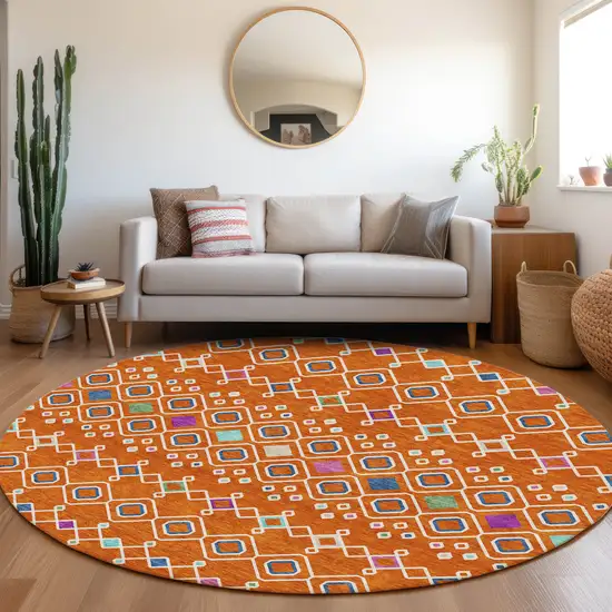 8' Orange Purple And Blue Southwestern Washable Round Rug With UV Protection Photo 4