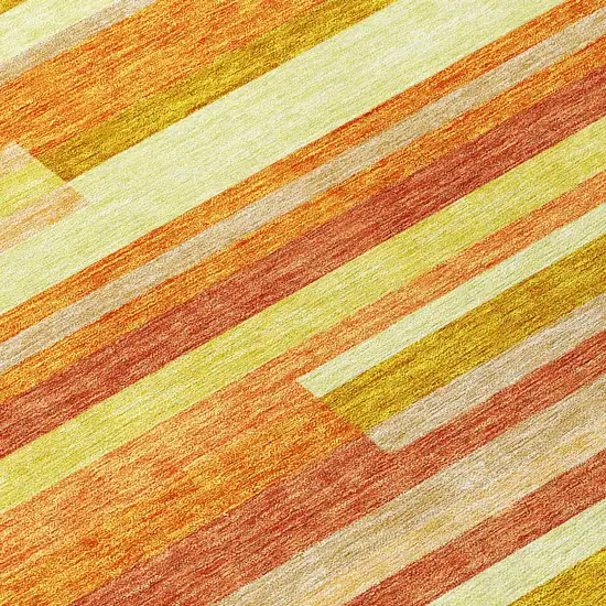 8' Orange Salmon And Lime Green Round Striped Washable Indoor Outdoor Area Rug Photo 9