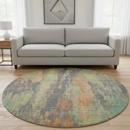8' Orange Teal And Gold Abstract Washable Round Rug With UV Protection Photo 2