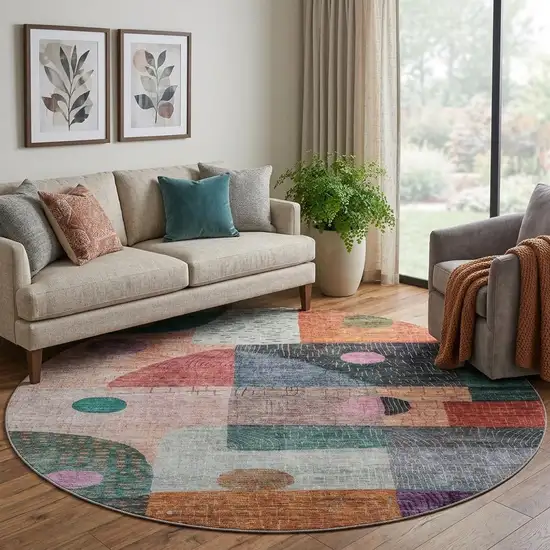 8' Orange Teal And Purple Geometric Washable Round Rug With UV Protection Photo 1