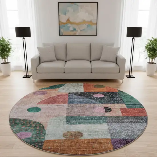 8' Orange Teal And Purple Geometric Washable Round Rug With UV Protection Photo 2