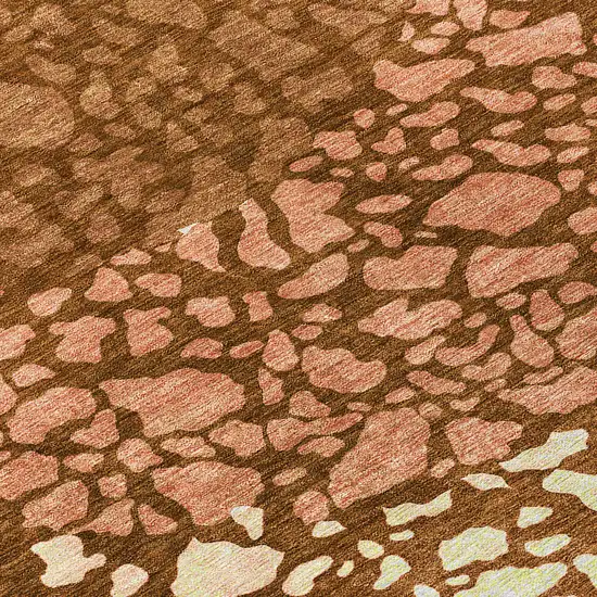 8' Orange Terra Cotta And Ivory Round Abstract Washable Indoor Outdoor Area Rug Photo 9